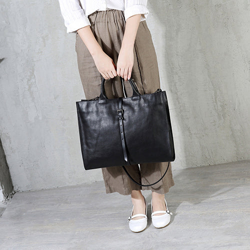 black leather tote bag with zipper